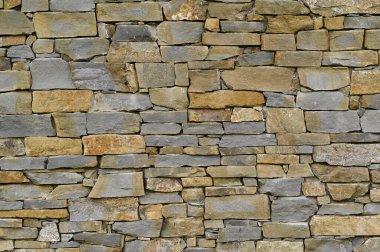 Tuğladan yapılmış taş duvar.