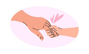 Çocuk, aile karikatürünü elinde tutuyor.