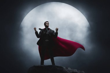 İş adamı 3D illüstrasyonun en üstünde duruyor