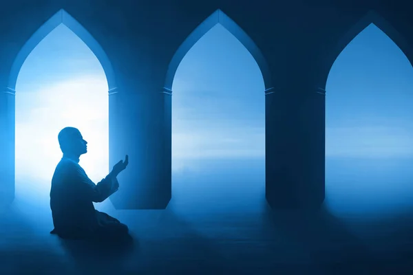 Muslim man praying in the mosque