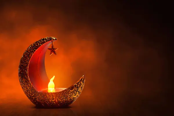 Golden crescent moon with star lantern on wooden floor at dark night with smoke, Ramadan kareem background