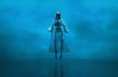 Gölde dumanlı sis ve Cadılar Bayramı temalı uçan ölüm meleği.