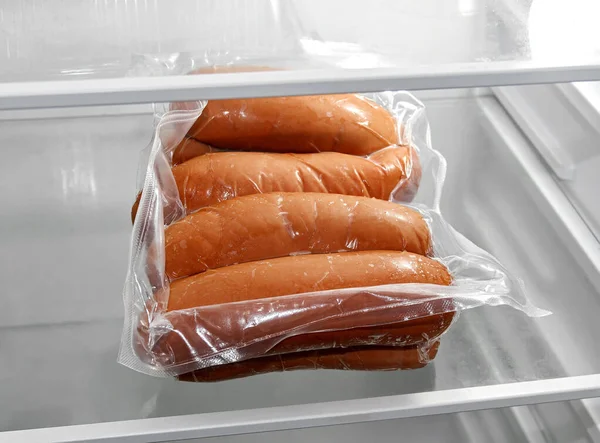 Sausages Package Glass Shelf — Stock Photo, Image