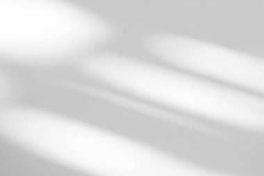 Abstract light reflection and grey shadow from window on white wall background. Gray shadow and sunshine diagonal geometric overlay effect for backdrop and mockup desig