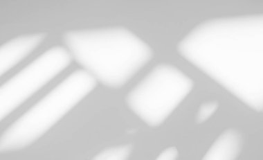 Abstract light reflection and grey shadow from window on white wall background. Gray window shadows and sunshine stripe diagonal geometric overlay effect for backdrop and mockup desig