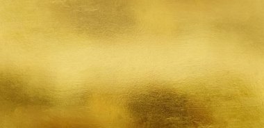 Altın duvar dokusu arka plan. Duvarda parlak sarı folyo boya, ışık yansıması, parlak altın renkli duvar kağıdı, yatay.