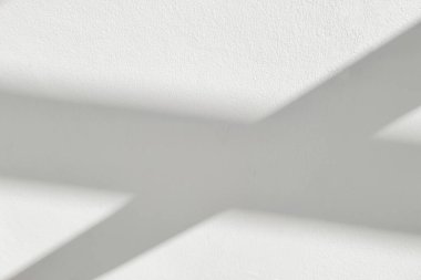 Gray shadow and light blur abstract background on white wall  from window. Dark stripe grey shadows indoor in room  background, monochrome, shadow overlay effect for backdrop and mockup desig