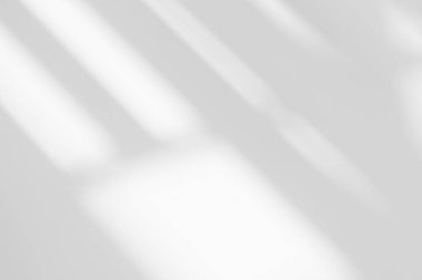 Gray shadow and light blur abstract background on white wall  from window. Dark stripe grey shadows indoor in room  background, monochrome, shadow overlay effect for backdrop and mockup desig