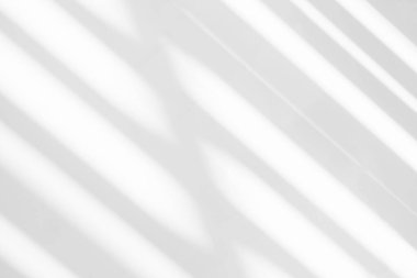 Gray shadow and light blur abstract background on white wall  from window. Dark stripe grey shadows indoor in room  background, monochrome, shadow overlay effect for backdrop and mockup desig