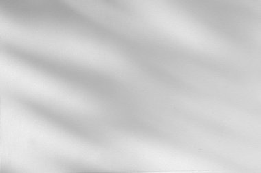 Abstract light reflection and grey shadow from window on white wall background. Gray shadow and sunshine diagonal geometric overlay effect for backdrop and mockup desig