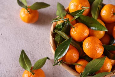 natural organic tangerines with green leaves