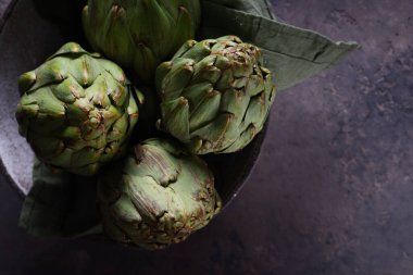 fresh organic natural green artichokes