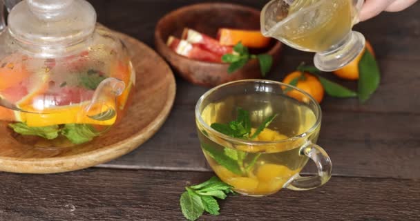 Tea Oranges Mint Glass Teapot 视频剪辑
