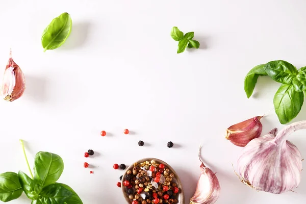 Stock image food background with fresh garlic herbs on white background