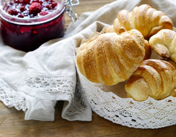 fresh baked goods croissants in a basket