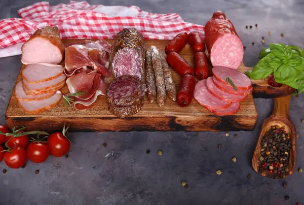 assorted deli meats ham, salami, prosciutto