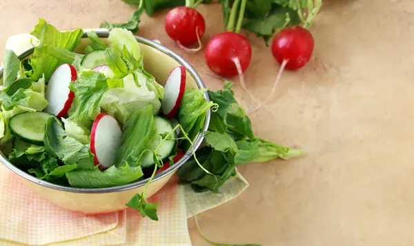 fresh lettuce and radish salad for healthy eating
