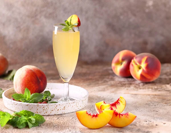 traditional drink with peaches bellini