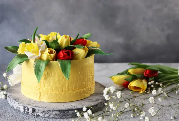 festival cake with spring decor and flowers