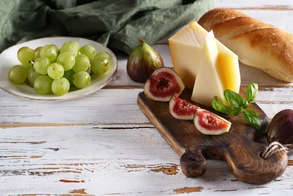 Cheese Board Baguette Grapes Royalty Free Stock Images