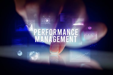 Tablete çizelgeler ve Performans Yönetimi yazıtı, iş konsepti ile dokunmak