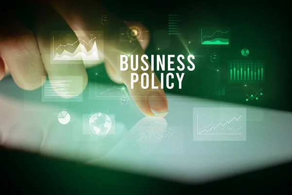 Vinger Aanraken Tablet Met Grafieken Business Policy Inscriptie Business Concept — Stockfoto