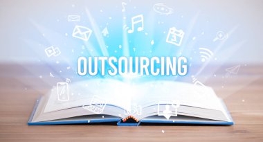 Opeen book with OutTSOURCING yazıt, business concept