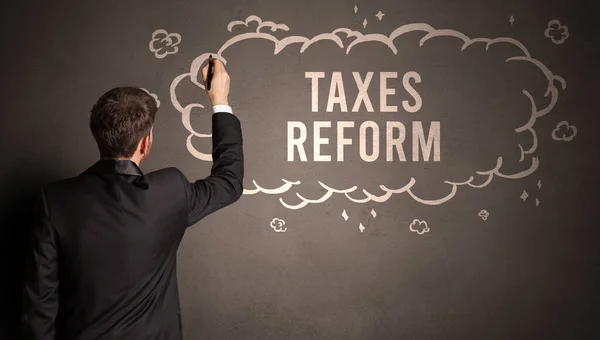 Empresário Desenhando Uma Nuvem Com Inscrição Taxes Reform Dentro Conceito — Fotografia de Stock