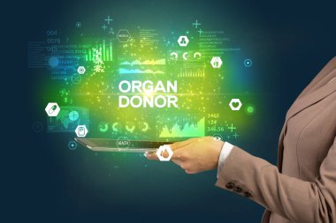 ORGAN DONOR yazıtı, tıbbi konsept içeren bir dokunmatik ekran kapat