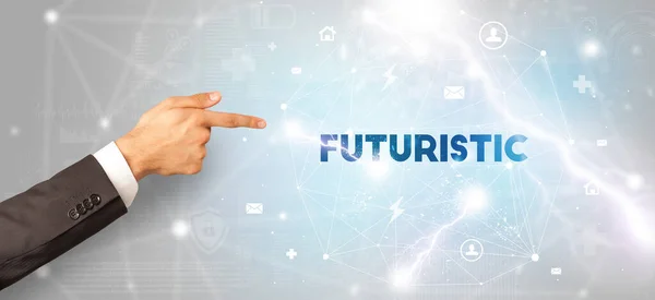 stock image Hand pointing at FUTURISTIC inscription, modern technology concept