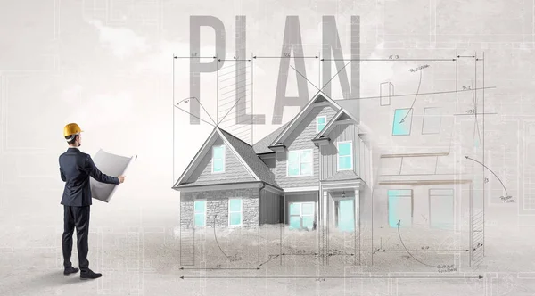 Młody Inżynier Posiadający Plan Napisem Plan Koncepcja Planowania Domu — Zdjęcie stockowe