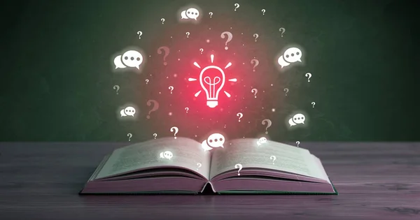 Open book with light bulb icons above, new business concept