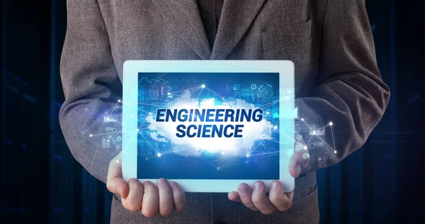 Young Business Person Working Tablet Shows Inscription Engineering Science — Stock Photo, Image
