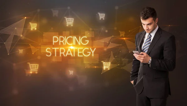 Affärsman Med Varukorg Ikoner Och Pricing Strategy Inskription Online Shopping Royaltyfria Stockfoton