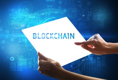 BLOCKCHAIN yazıtlı el yapımı fütüristik tablet, yeni teknoloji kavramı