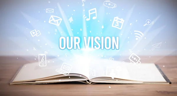 Opeen book with OUR VISION inscription, business concept