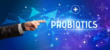 ProBIOTICS yazıtına, tıbbi konsepte yakın çekim el işareti