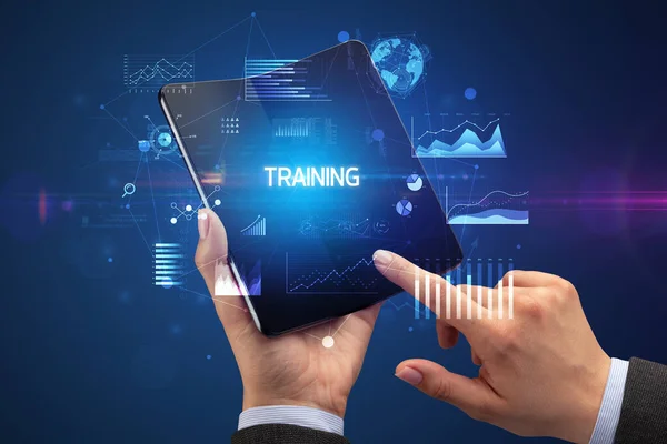 Businessman Holding Foldable Smartphone Training Inscription Successful Business Concept — Stock Photo, Image