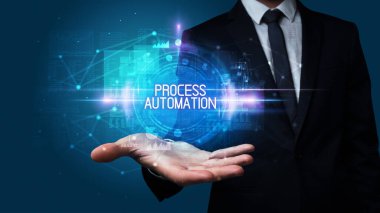 İnsan eli ele tutuşan Prosedürler AUTOMATION yazıtları, teknoloji kavramı