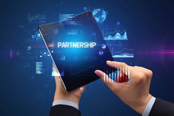 Businessman Holding Foldable Smartphone Partnership Inscription Successful Business Concept — Stock Photo, Image