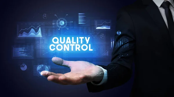Hand Businessman Holding Quality Control Inscription Business Success Concept — Stock fotografie