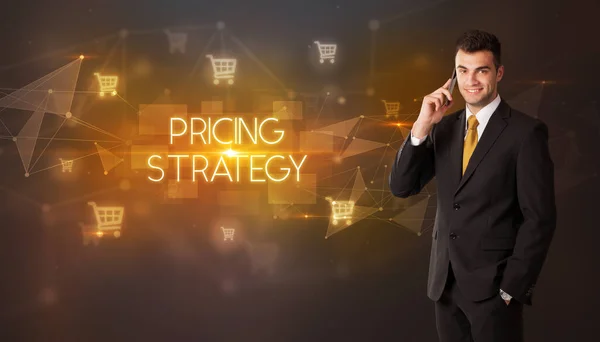 Affärsman Med Varukorg Ikoner Och Pricing Strategy Inskription Online Shopping Royaltyfria Stockbilder