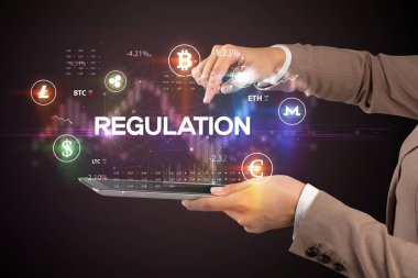 Bir dokunmatik ekran yakın çekim REGULATION yazıt, iş fırsatı konsepti