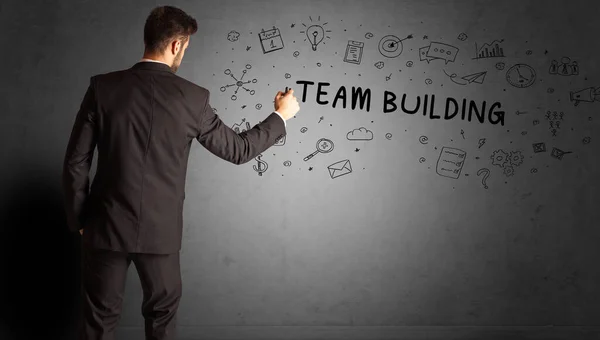 Biznesmen Rysunek Kreatywny Pomysł Napisem Team Building Koncepcja Strategii Biznesowej — Zdjęcie stockowe