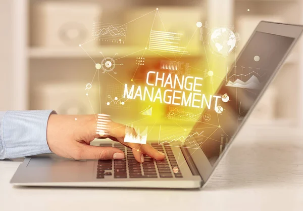 stock image Side view of a business person working on laptop with CHANGE MANAGEMENT inscription, modern business concept