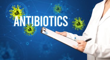 Doktor, AnTIBIOTICS yazıtları ve salgın konseptiyle reçete yazıyor.