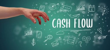 CASH FLOW yazıtı, modern iş çözümü kavramına işaret eden kırpılmış elin yakın çekimi