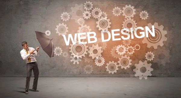 Επιχειρηματίας Υπερασπίζεται Ομπρέλα Από Επιγραφή Web Design Έννοια Της Τεχνολογίας — Φωτογραφία Αρχείου