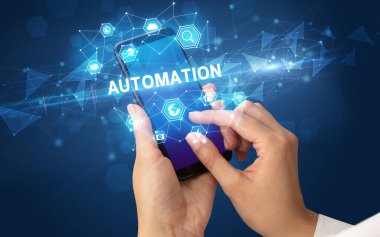 AUTOMATION yazıtlı akıllı telefon, modern teknoloji konsepti