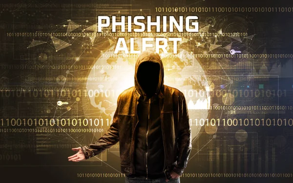 stock image Faceless hacker at work with PHISHING ALERT inscription, Computer security concept